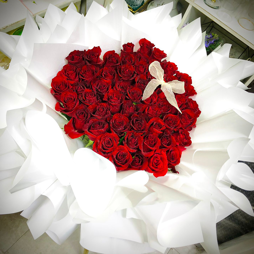 99 Rose in White Heart bouquet