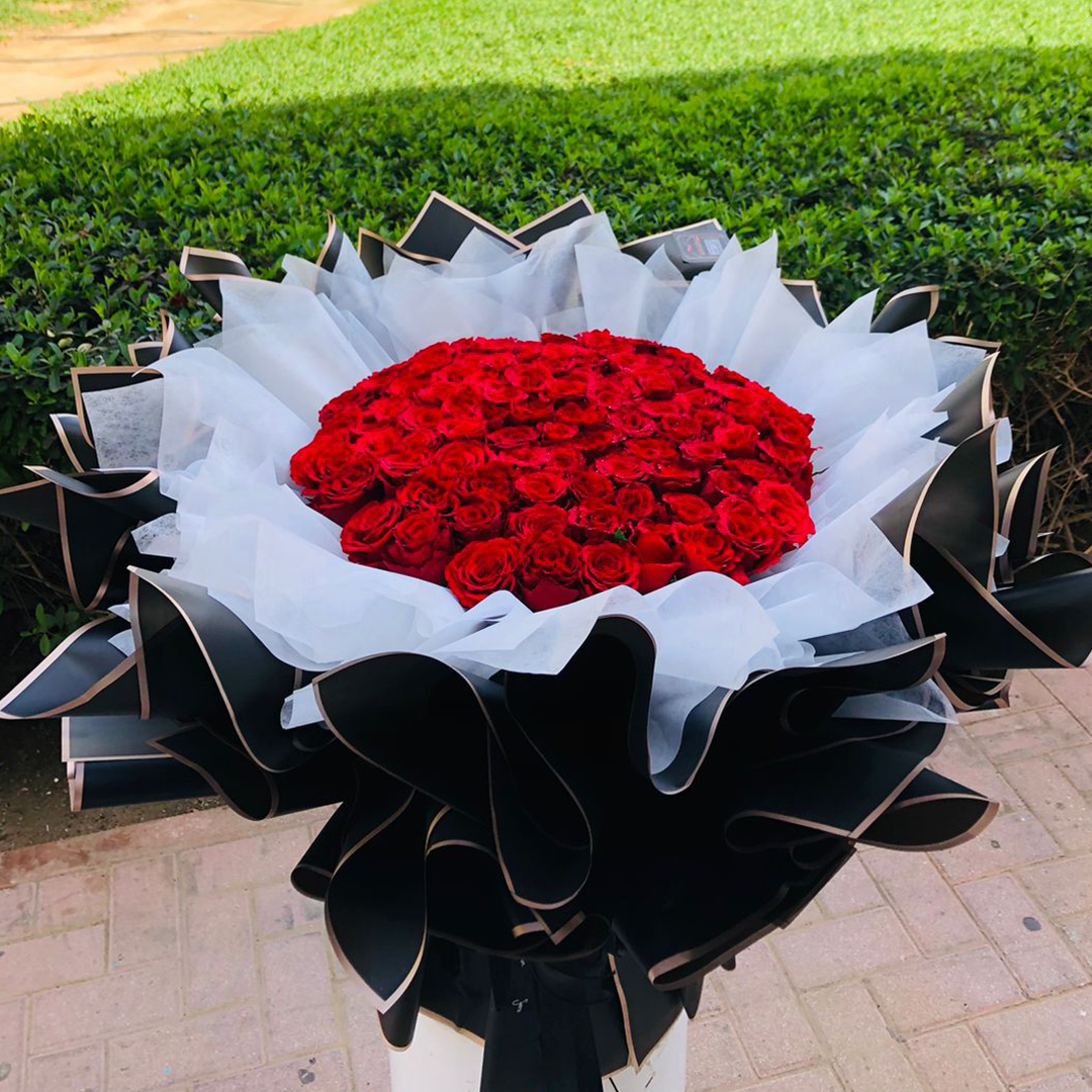 99 Red Roses in Round Bouquet