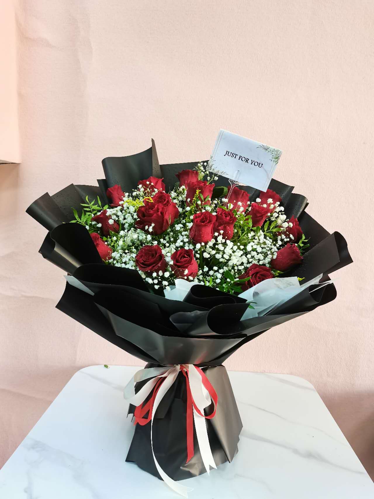 Red Roses in Black Bouquet