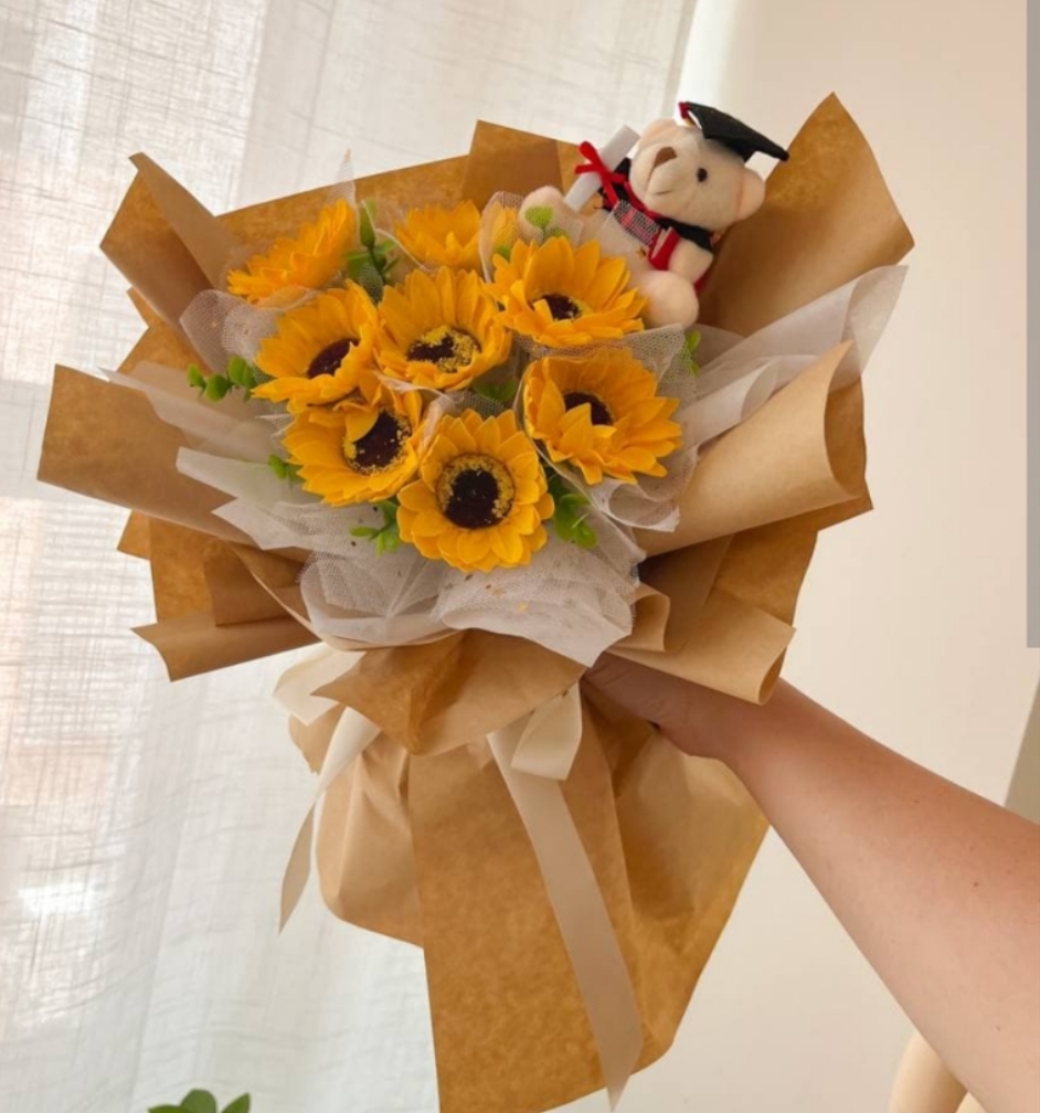 Fresh Sunflower with Graduation Stuff toys | Flower Gift Center